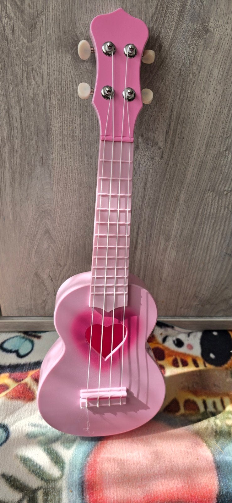 Roze speelgoedgitaar / ukelele met hartje, Ophalen of Verzenden, Nieuw, Meisje