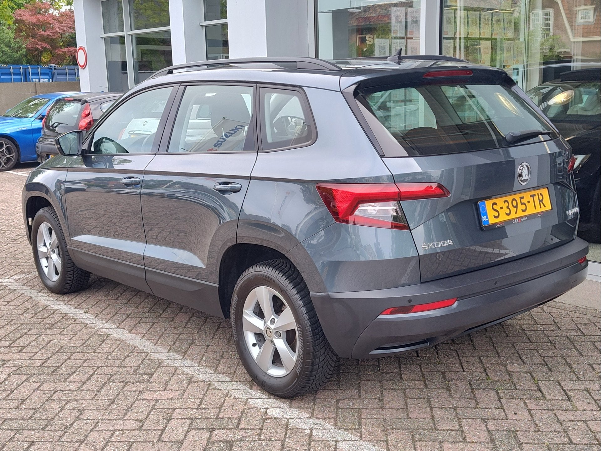 Skoda Karoq 1.0 TSI AMBITION BUSINESS DSG Navi | Clima | Cru, 12 maanden, Stof, Gebruikt, 1261 kg