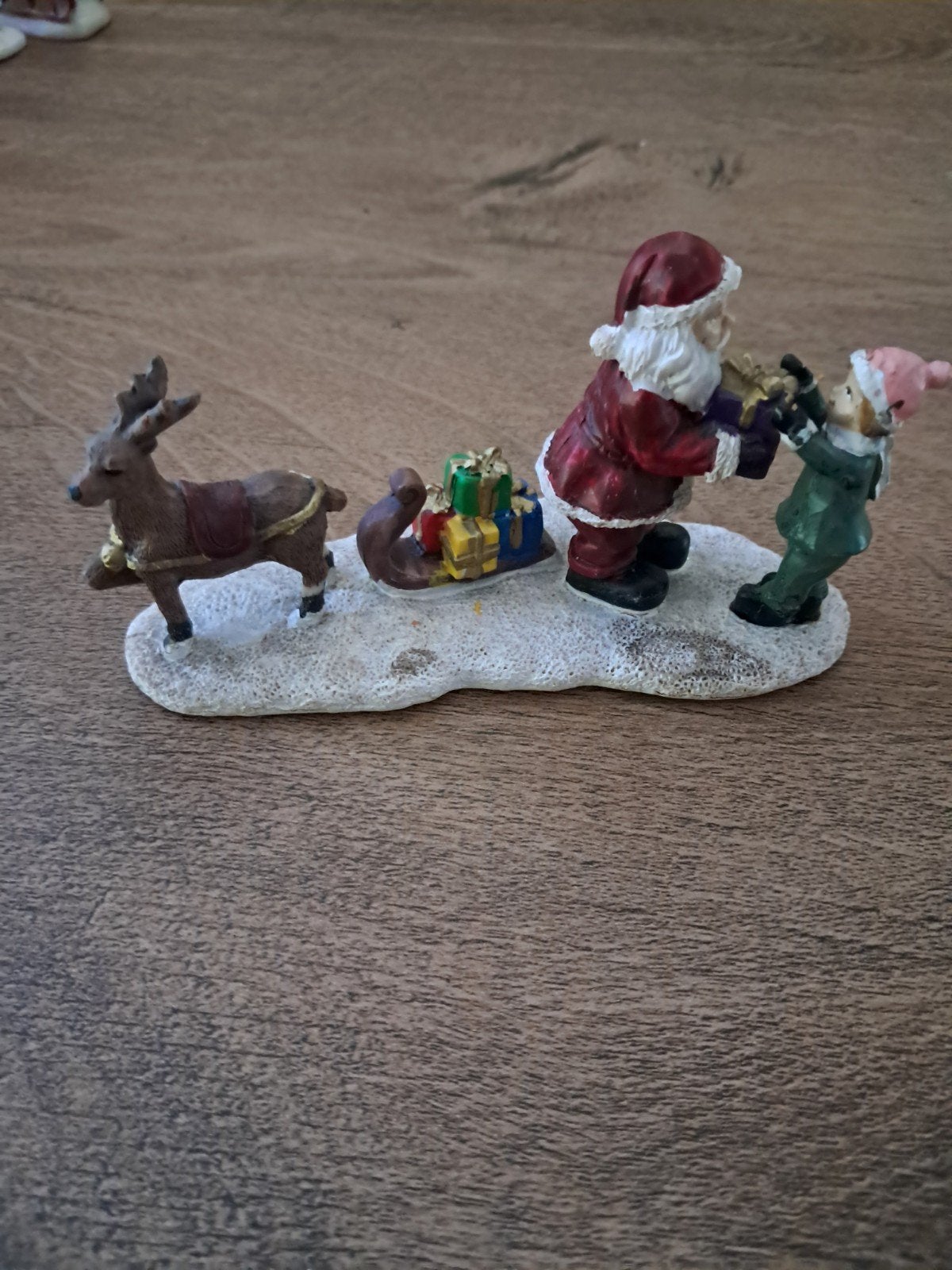 kerstman met rendier en kind, Diversen, Ophalen