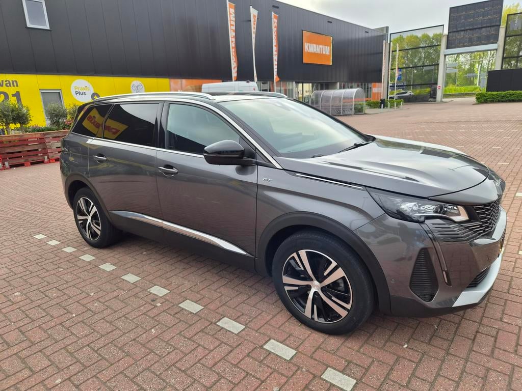 Peugeot 5008 1.2 Puretech 130pk S&S Eat8 2023 Grijs, Auto's, Peugeot, 1199 cc, Adaptieve lichten, 3 cilinders, 1405 kg