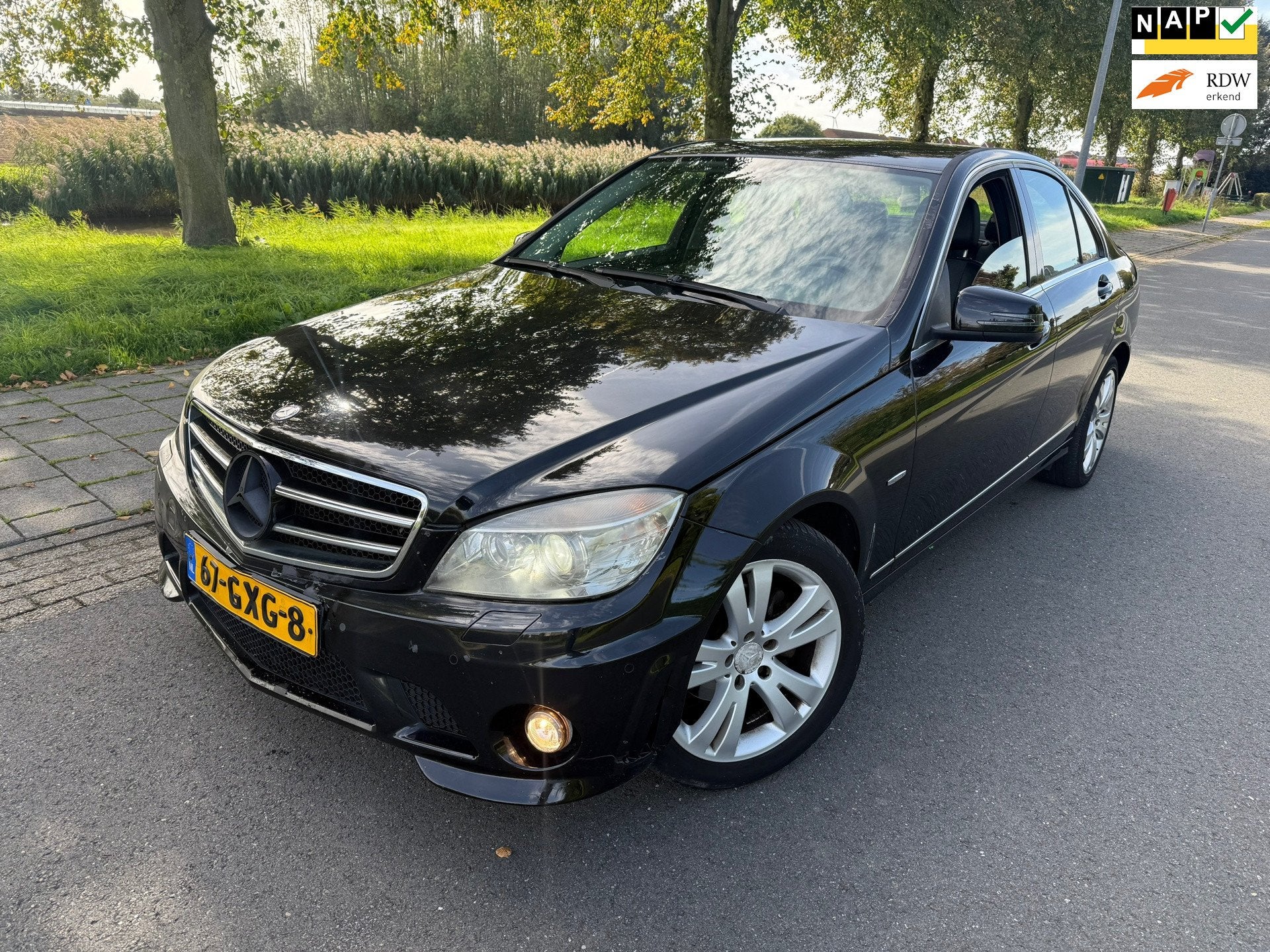 Mercedes-Benz C-klasse 180 K Avantgarde CLIMA/CRUISE/NAVI/XE, Auto's, Gebruikt, Zwart, Parkeersensor, Leder en Stof