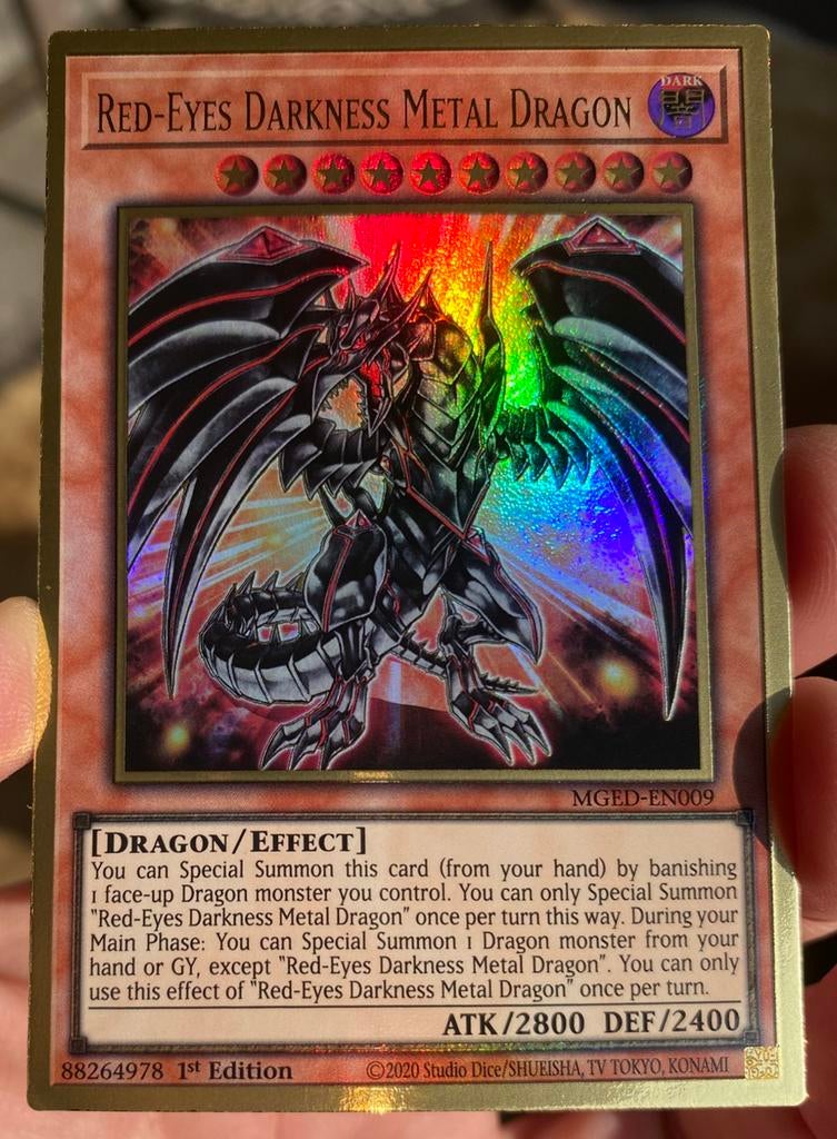 Yu-Gi-Oh! Red-Eyes Darkness Metal Dragon MGED 1st Ed !, Ophalen of Verzenden, Zo goed als nieuw, Losse kaart, Foil