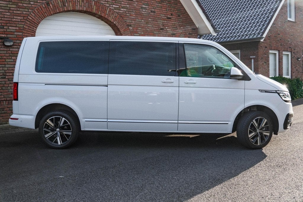 Volkswagen Caravelle T6.1 204 pk L2H1 Highline 2x Elek. Schu, Auto's, Gebruikt, Volkswagen, Wit, Leder
