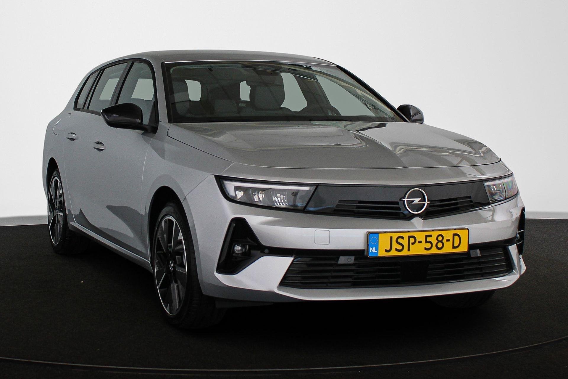 Opel Astra Sports Tourer Electric 54 kWh Edition Apple CarPl, Auto's, Stof, Gebruikt, 156 pk, Origineel Nederlands