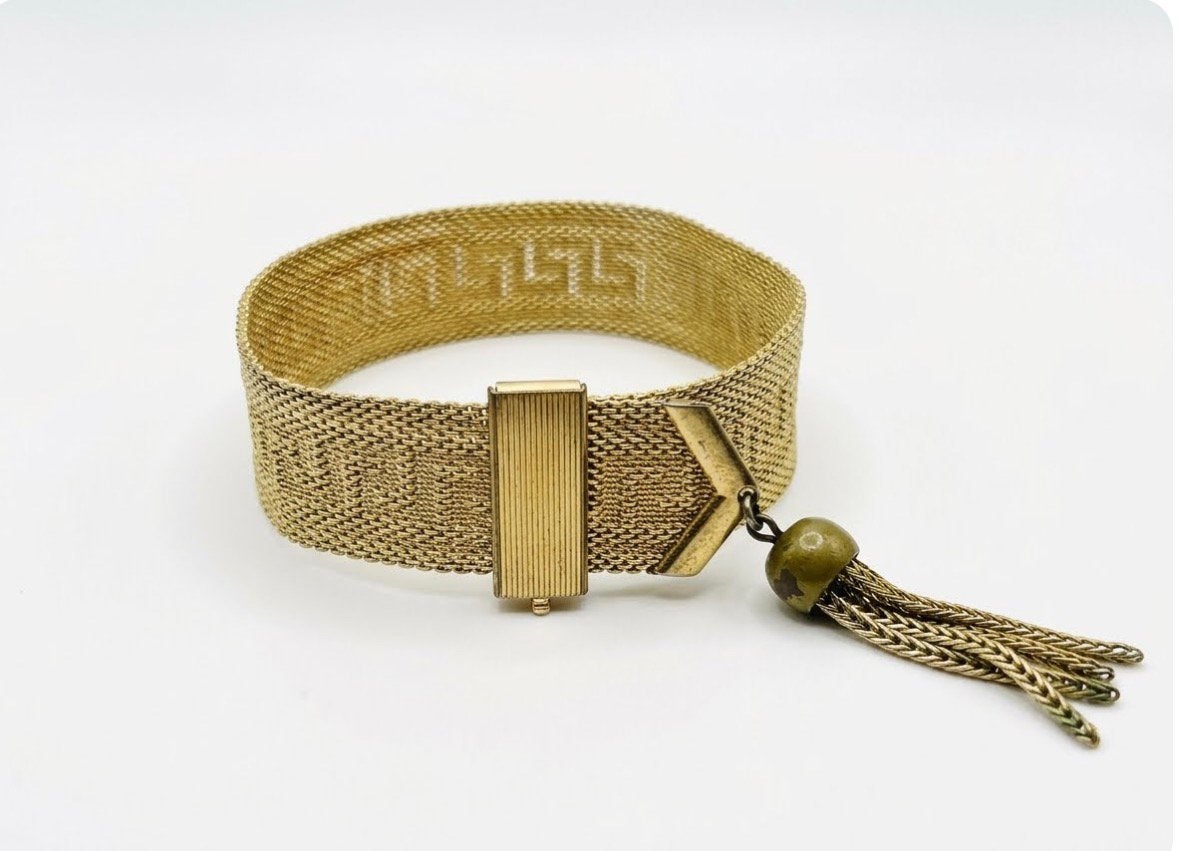 Zeldzame Vintage Greek Key Mesh Armband met Kwastje Jaren 60, Ophalen of Verzenden, Gebruikt, Goud, Overige materialen