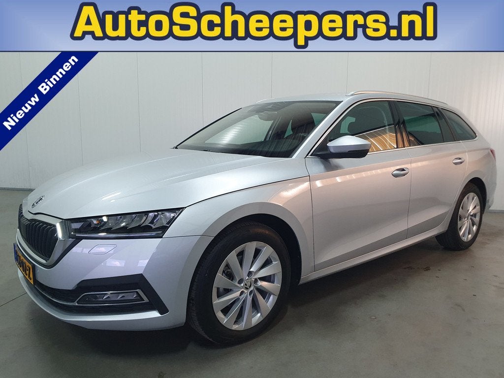 Skoda Octavia Combi 1.0 e-TSI Business Edition NAVI/CARPLAY/, Stof, Gebruikt, Euro 6, 1252 kg