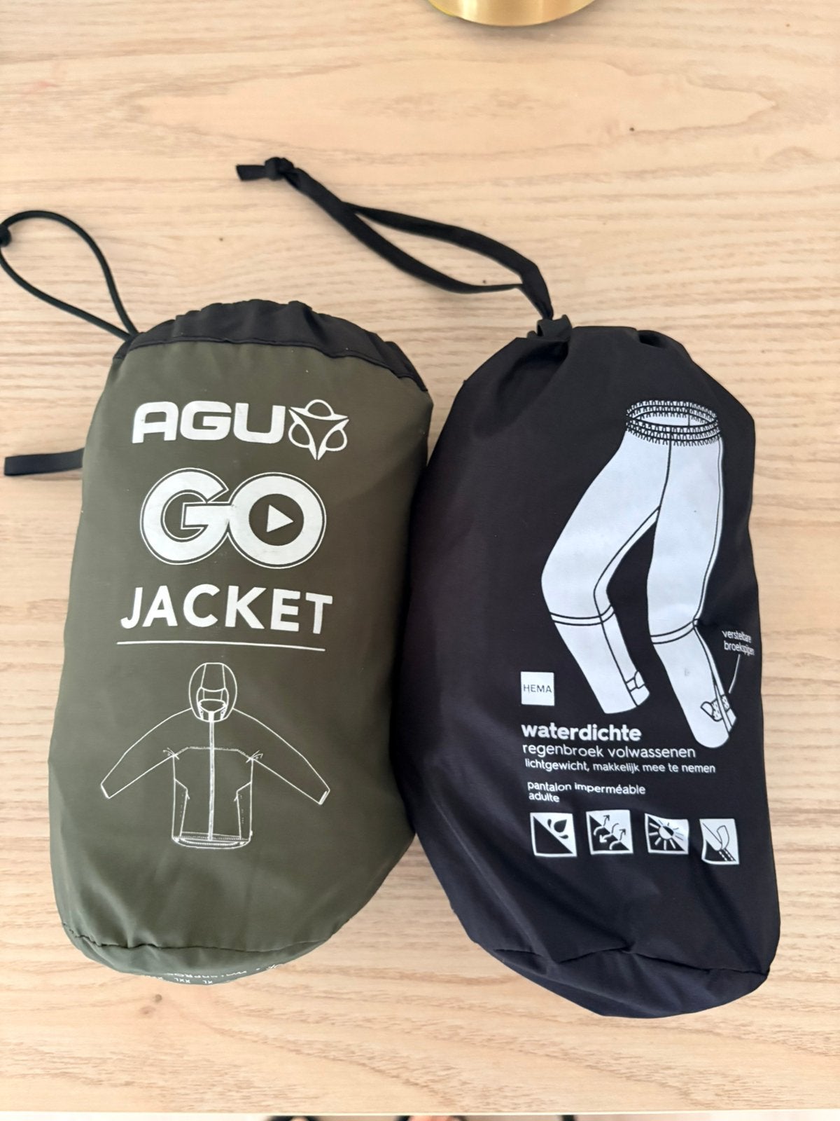 AGU regenjas en Hema regenbroek mt M, Ophalen of Verzenden, Zo goed als nieuw, Regenjas