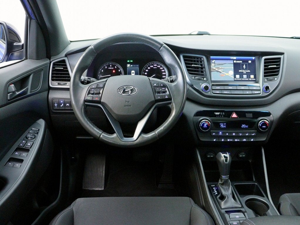Hyundai Tucson 1.6 T-GDi 4WD Comfort Plus Automaat | Pano |, Stof, Gebruikt, 4 cilinders, Blauw