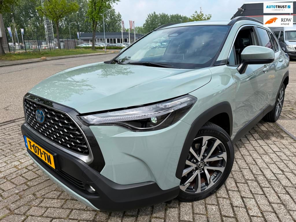 Toyota Corolla Cross 2.0 HIGH POWER Hybrid FIRST EDITION NAP, Gebruikt, 4 cilinders, Met garantie (alle), 152 pk