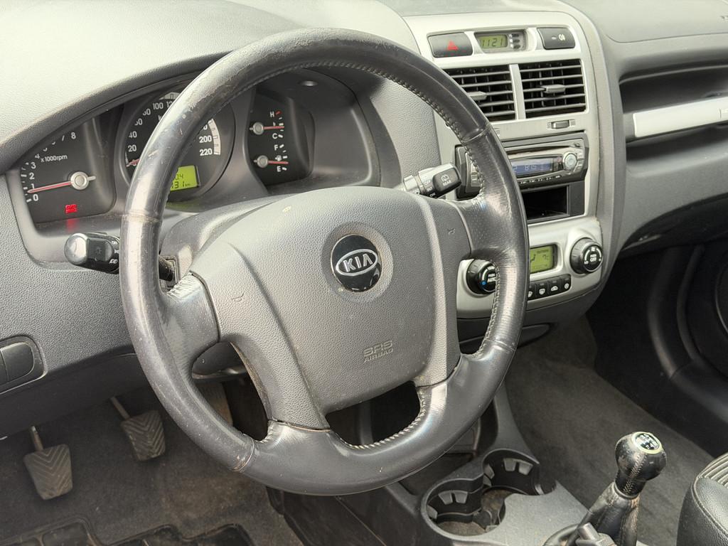 Kia Sportage 2.0 CVVT X-ecutive | Apk tot 23-03-2027 | Cruis, 1442 kg, Stof, Gebruikt, Zwart