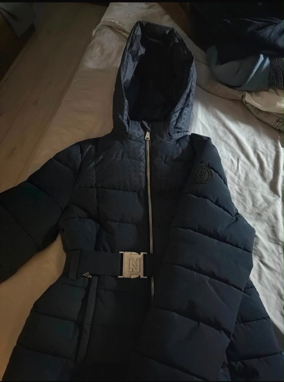 Originele Nikkie jas donkerblauw - Zo goed als nieuw, Ophalen of Verzenden, Zo goed als nieuw, Maat 42/44 (L), Blauw
