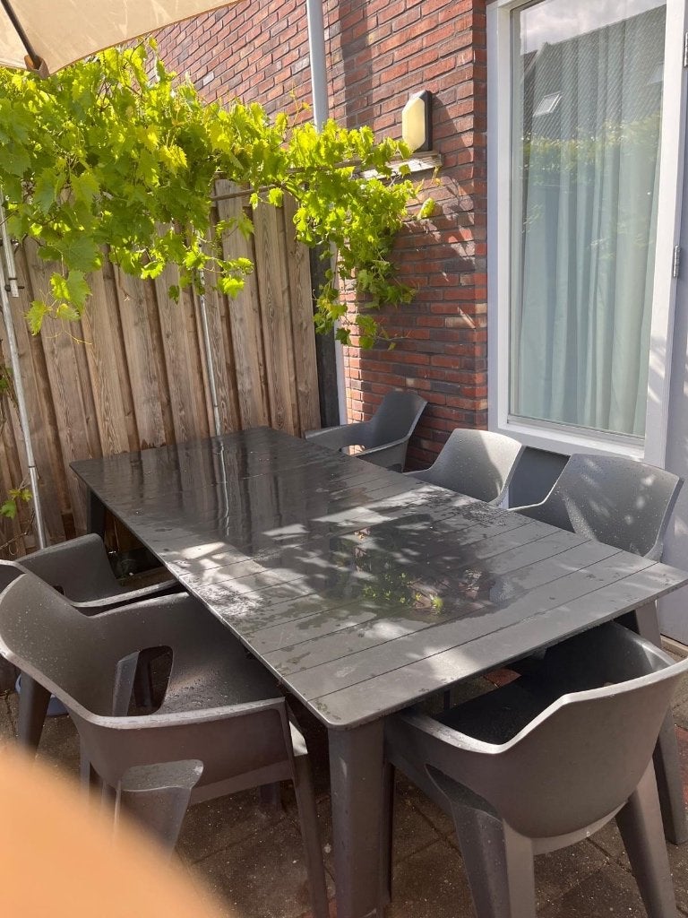Tuinset met 6 stoelen, kussens en grote parasol, Ophalen of Verzenden, Gebruikt