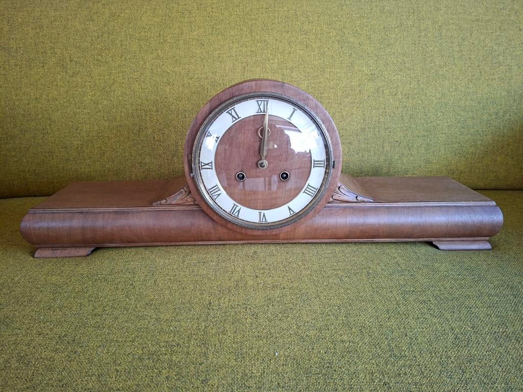 Antieke houten pendule, Ophalen