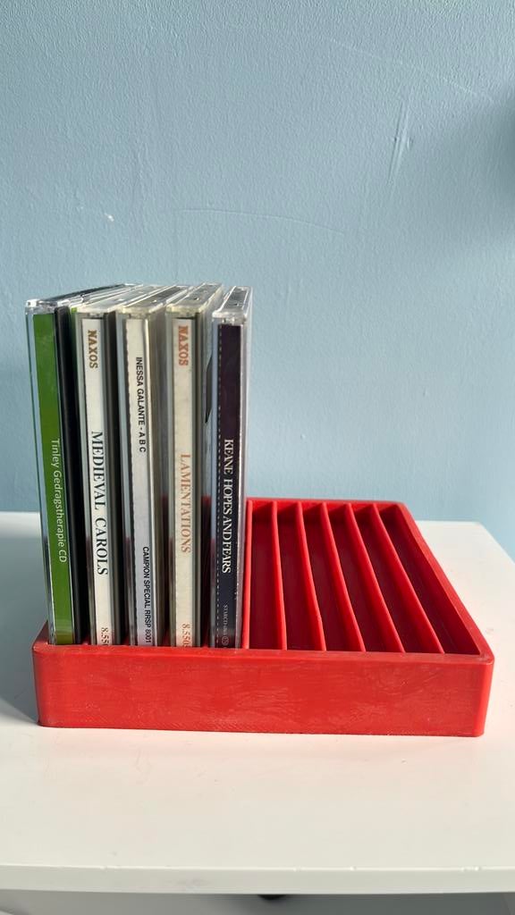 Ikea Fragg cd  standaard rubber rood., Ophalen of Verzenden, Zo goed als nieuw, Kunststof, Cd's