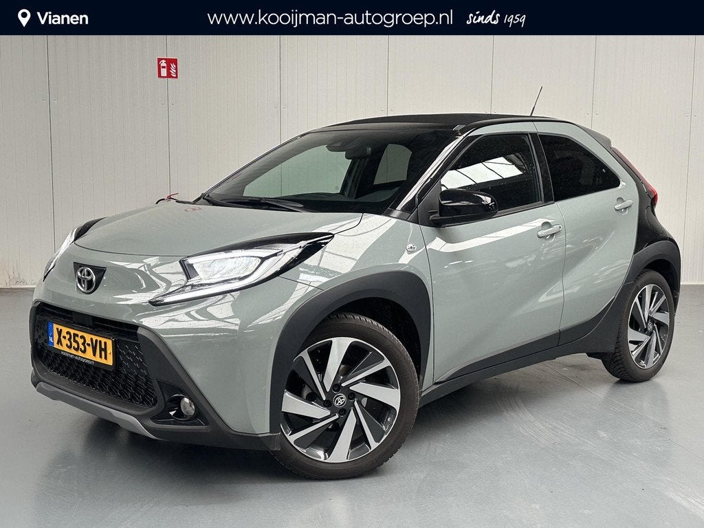Toyota Aygo X 1.0 VVT-i MT Envy + Cabriodak, 1e eigenaar NL, Auto's, Toyota, Gebruikt, Cabriolet, 4 stoelen, Leder en Stof