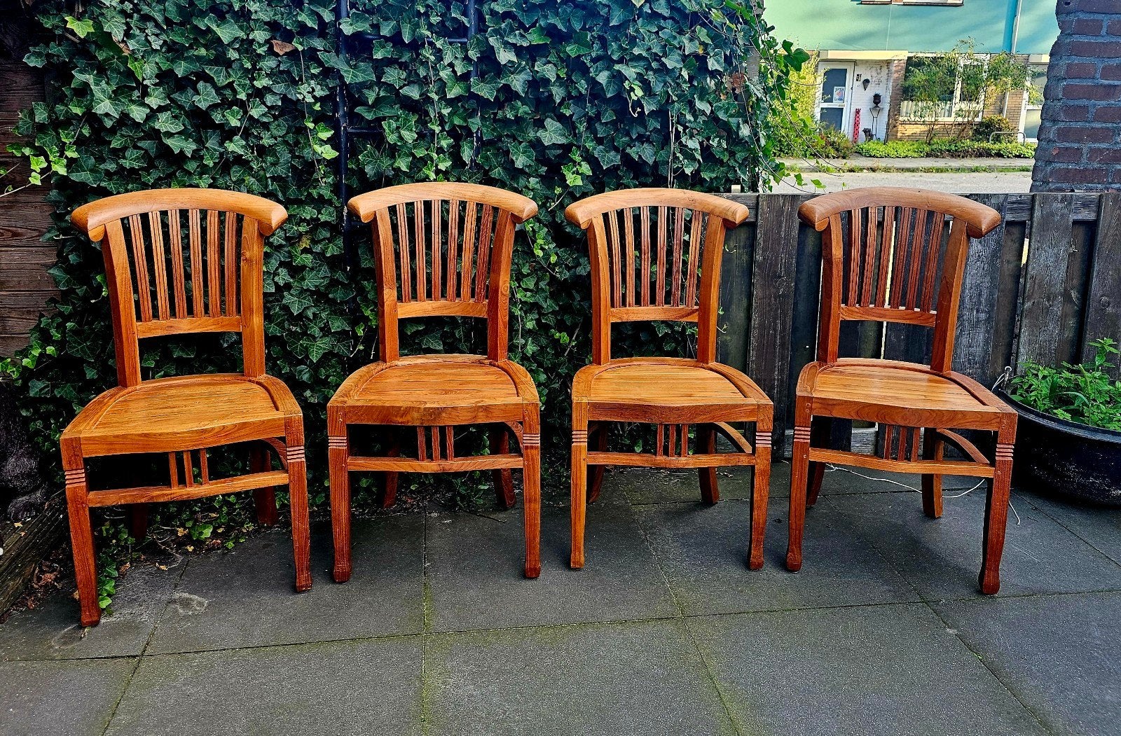 Set van 4 massief teakhouten eetkamerstoelen, Ophalen, Zo goed als nieuw, Bruin
