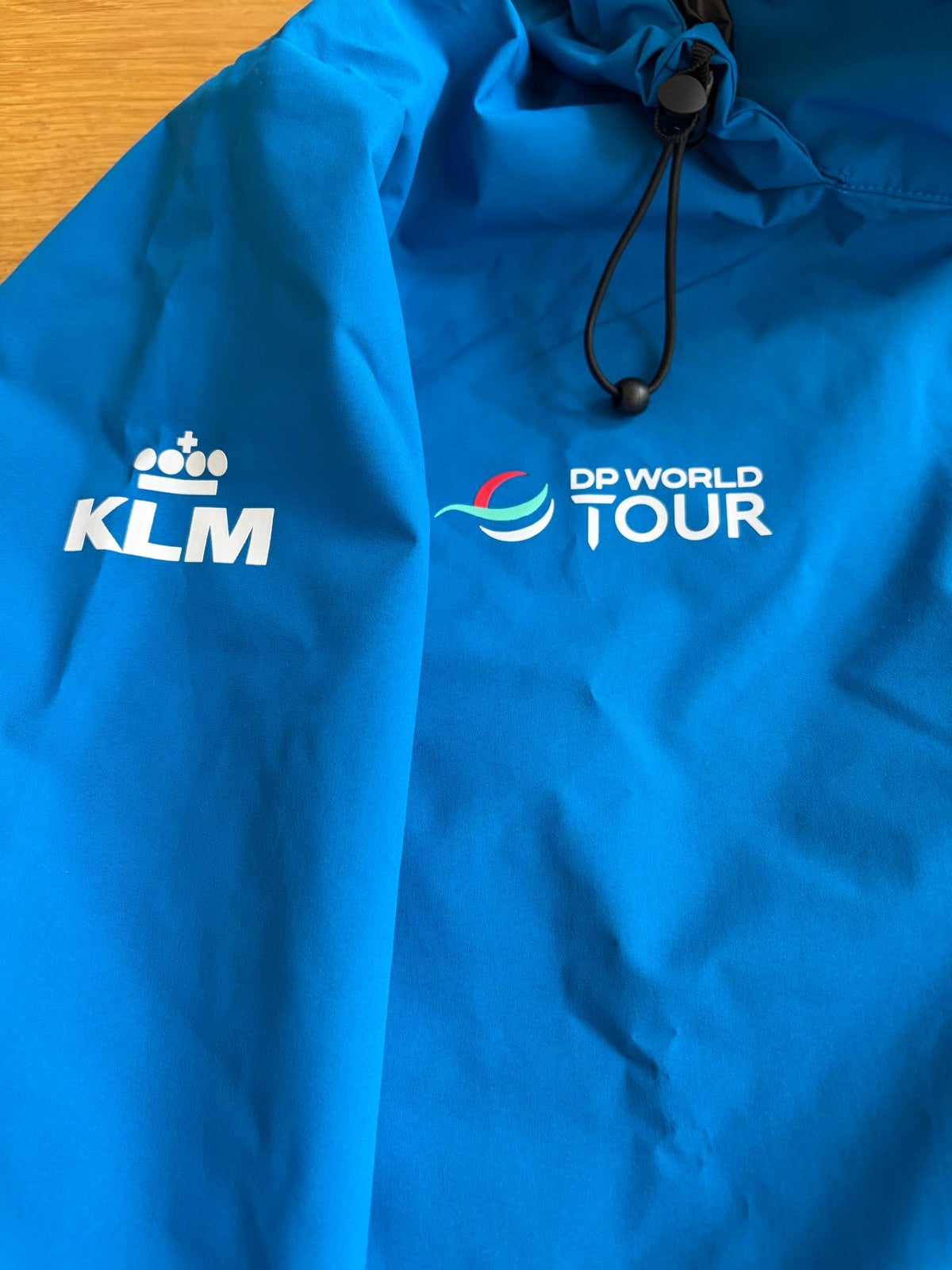 Golf Code-Zero KLM DP World Tour regenjack Maat M, Kleding | Heren, Ophalen of Verzenden, Nieuw, Maat 48/50 (M), Blauw