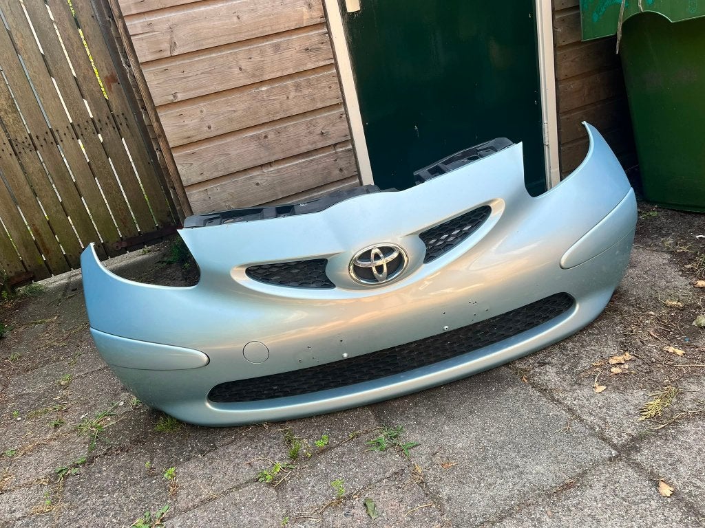 Toyota Aygo voorbumper 2005–2014 – zilver/grijs – origineel, Auto-onderdelen, Ophalen, Gebruikt, Voor, Toyota