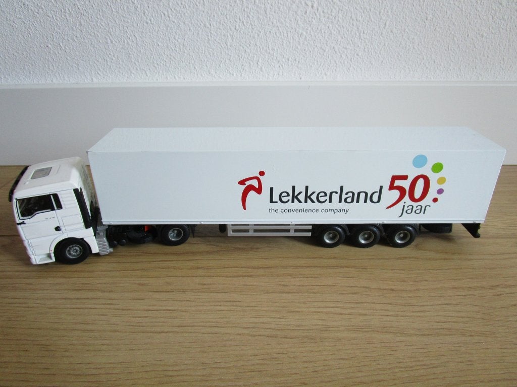 MAN Lekkerland 50 jaar, Hobby en Vrije tijd, Modelauto's | 1:50, Ophalen, Zo goed als nieuw, Bus of Vrachtwagen, Lion Toys