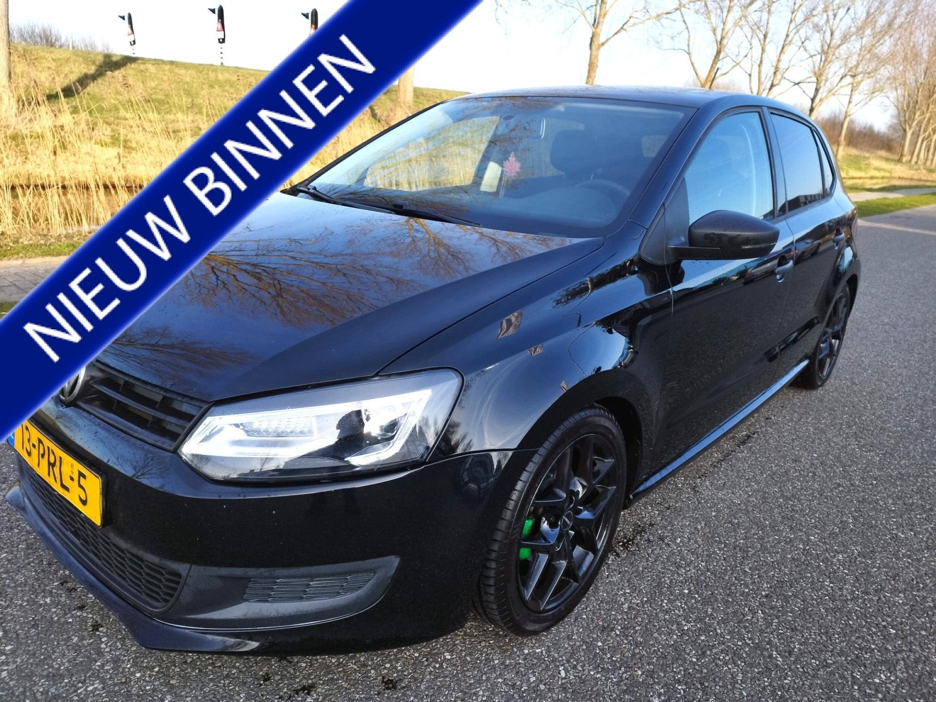 Volkswagen Polo 1.2 * 5 DRS * NAVI * Bluetooth * Sportonders, Voorwielaandrijving, Euro 5, Zwart, 60 pk