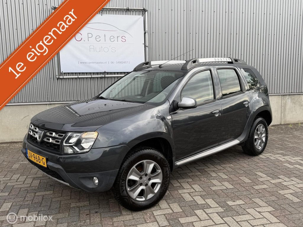 Dacia Duster 1.2 TCe 4x2 Prestige 2016 / Navigatie / Trekhaa, Auto's, Gebruikt, Euro 6, Duster, 635 kg