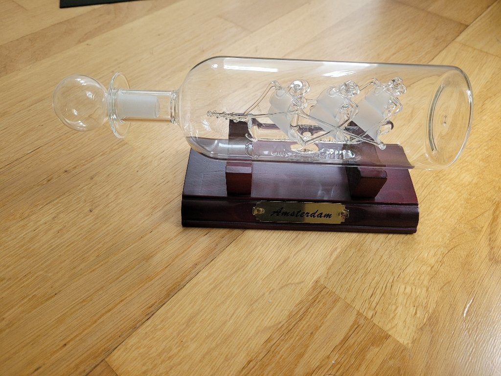 Glazen bootje in fles, Ophalen