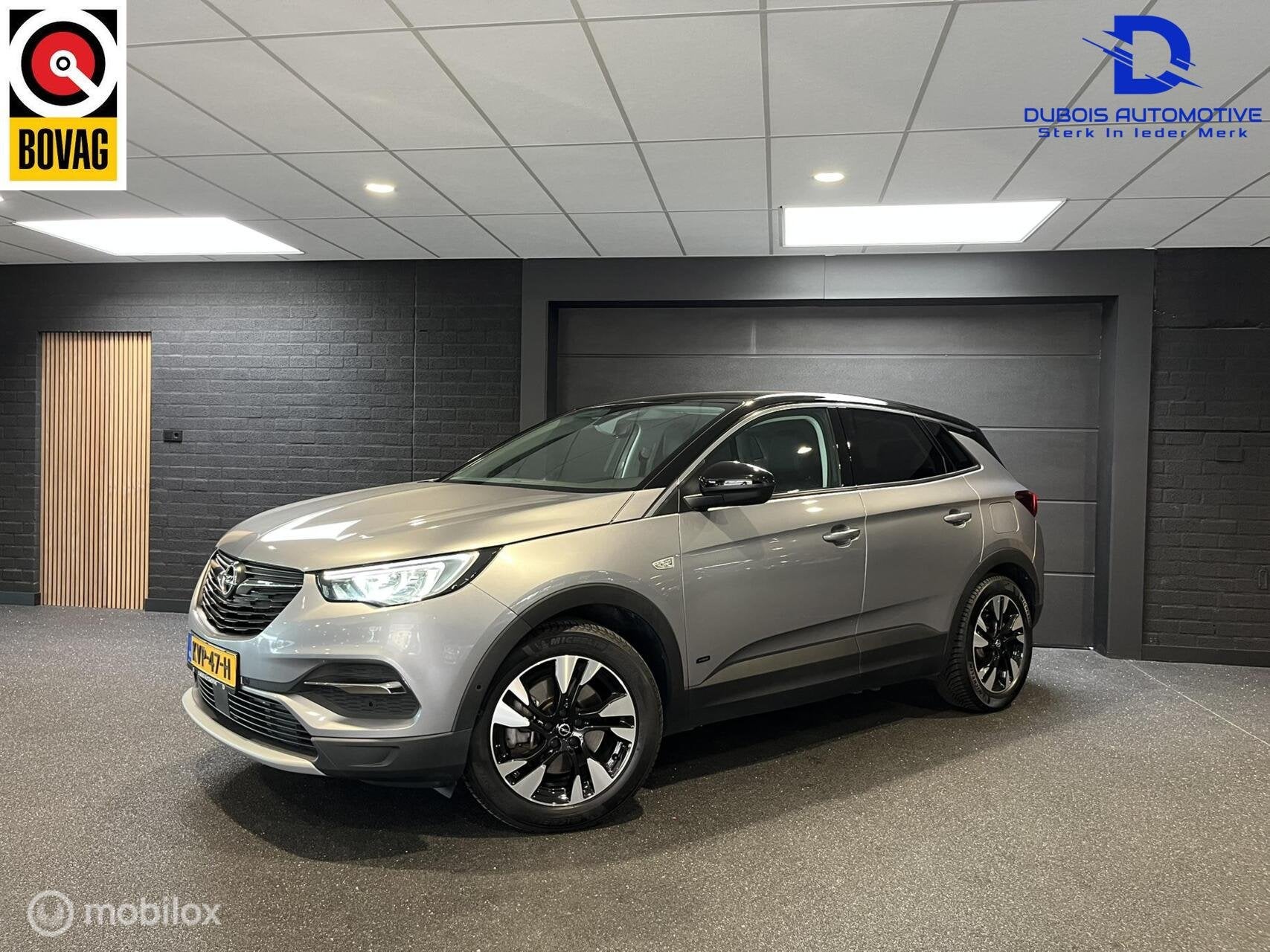 Opel Grandland X 1.6 Turbo Hybrid Executive|CRUISE|CAMERA|, Gebruikt, 4 cilinders, Met garantie (alle), Leder en Stof