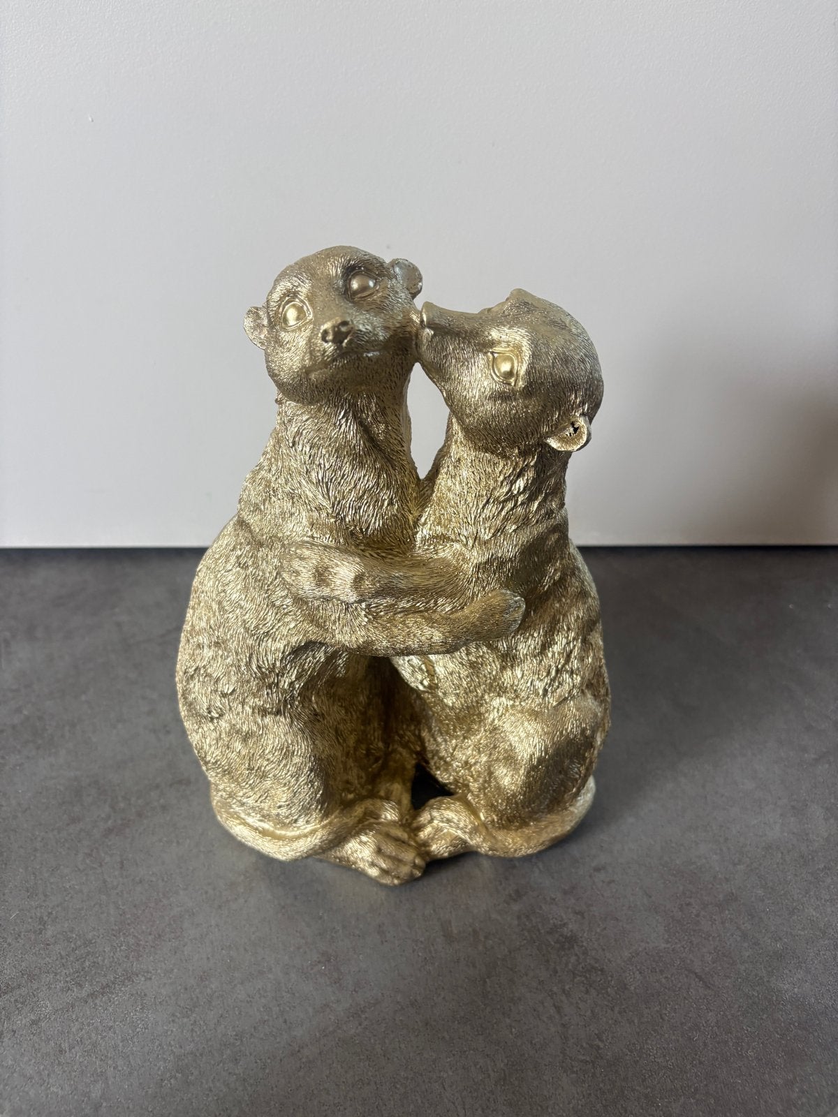 Gouden stokstaartjes beeldje - Liefdevol decoratiestuk, Ophalen, Zo goed als nieuw, Goud, Metaal