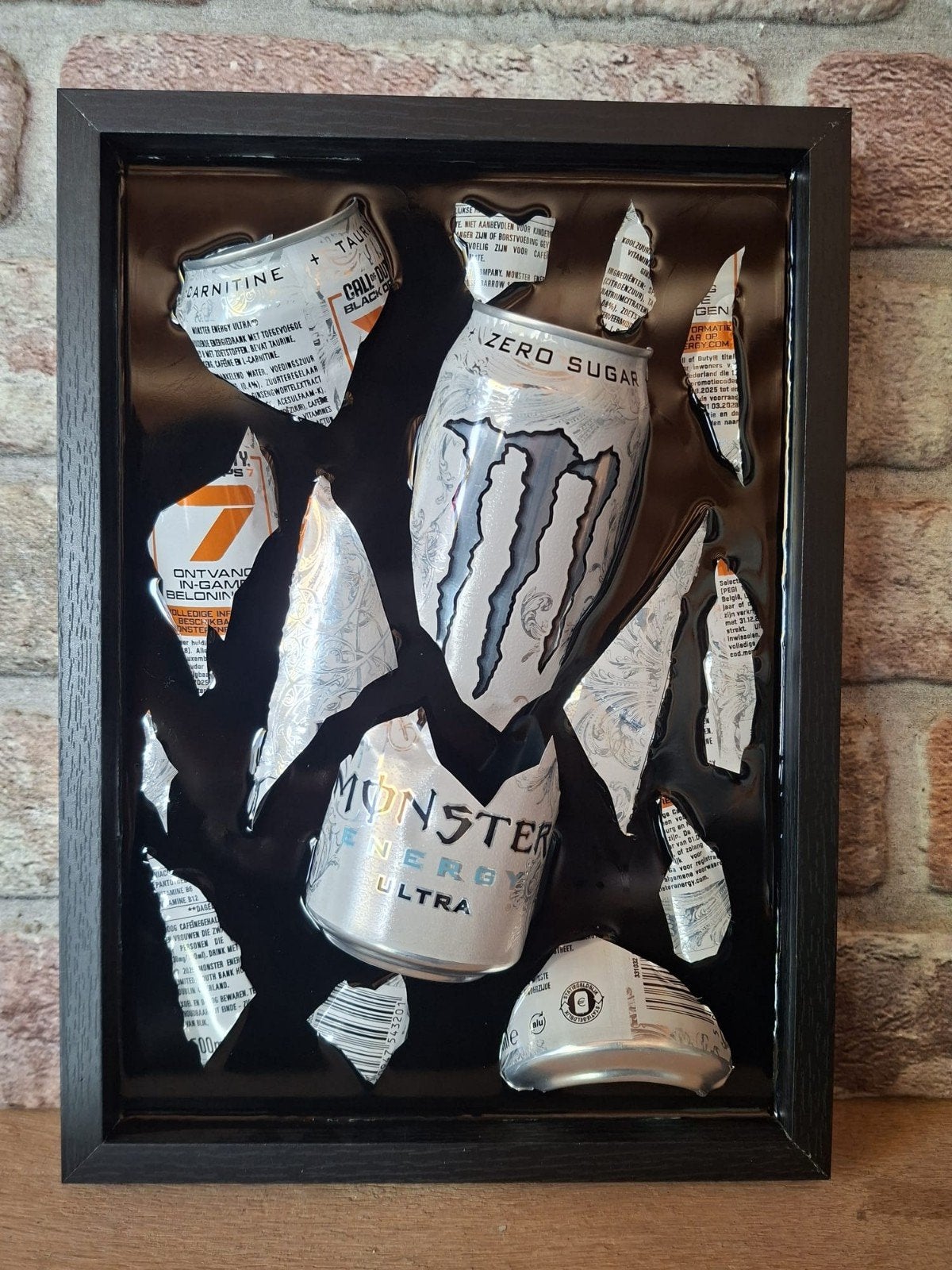 monster blikje verwerkt in een lijst 23x33 met Epoxy, Ophalen of Verzenden