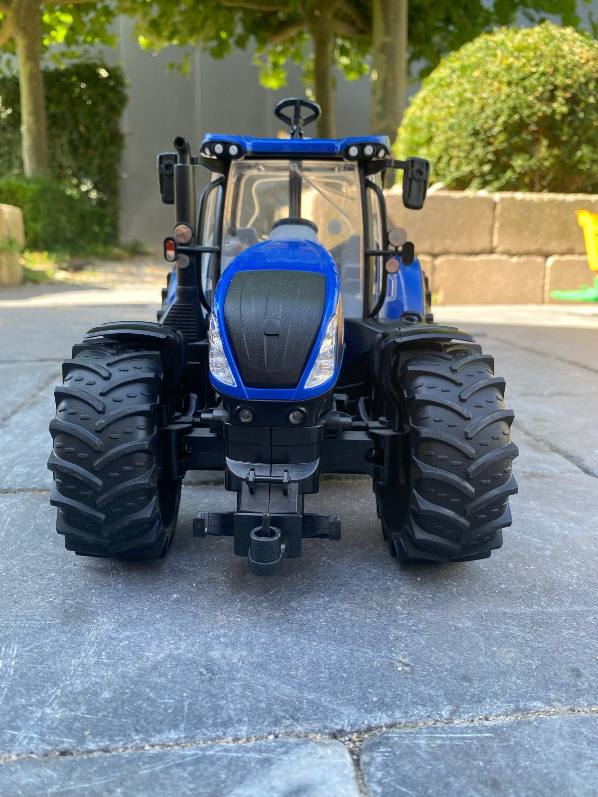 New Holland T7.315 speelgoedtractor met boer, Ophalen, Zo goed als nieuw