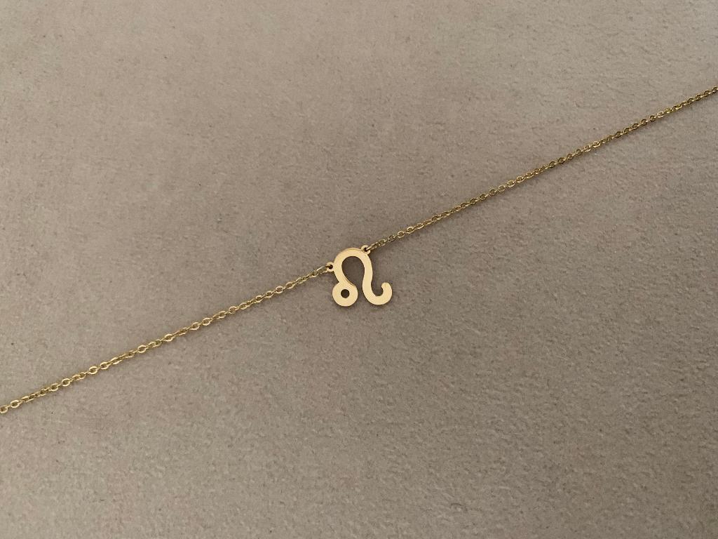 Gouden ketting met sterrenbeeld bedel Leeuw waterproof, Nieuw, Ophalen of Verzenden, Goud, Overige materialen