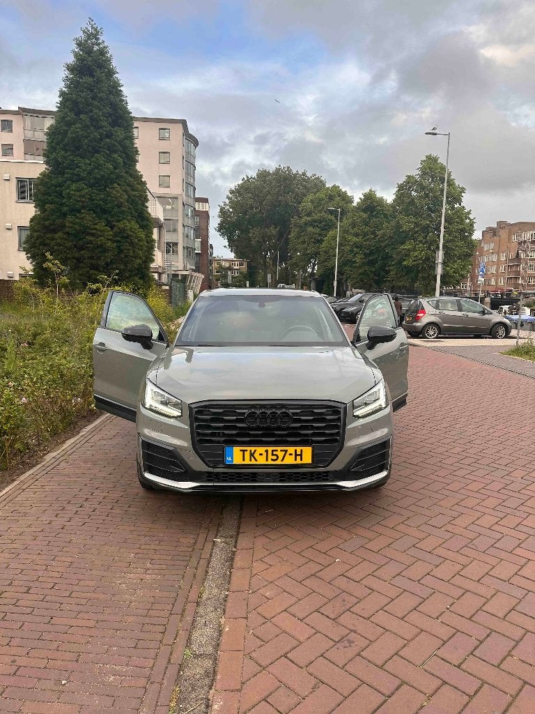 Audi Q2 1.4 Tfsi CoD 150pk S Tronic 2018 Grijs, Automaat, 4 cilinders, Leder en Stof, Origineel Nederlands