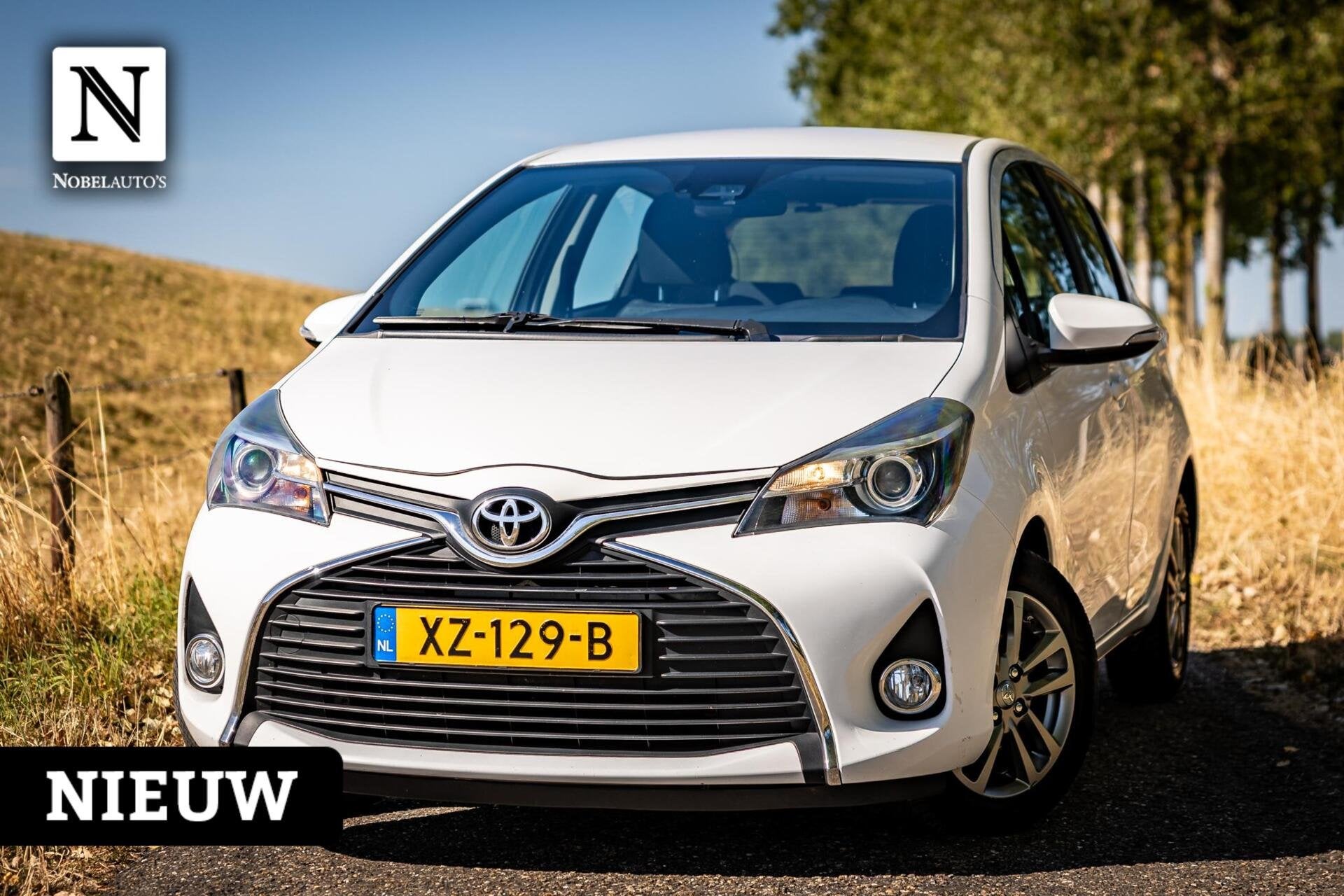 Toyota Yaris 1.3 VVT-i Orange Sport |Camera |Cruise |Airco, Auto's, Toyota, Euro 6, 4 cilinders, Met garantie (alle), Wit