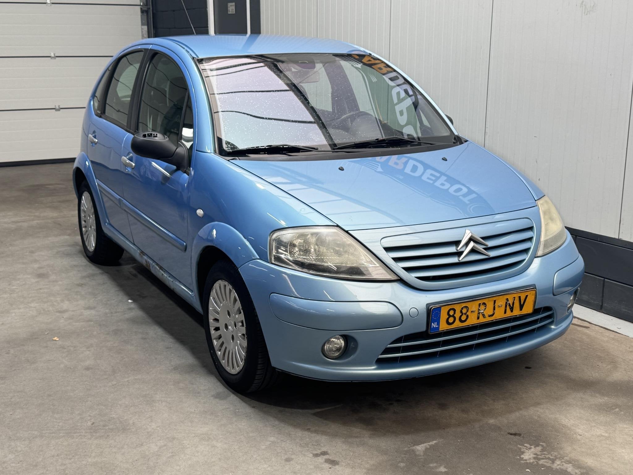 Citroen C3 1.4i Exclusive, Auto's, Citroën, Voorwielaandrijving, Stof, Blauw, Handgeschakeld