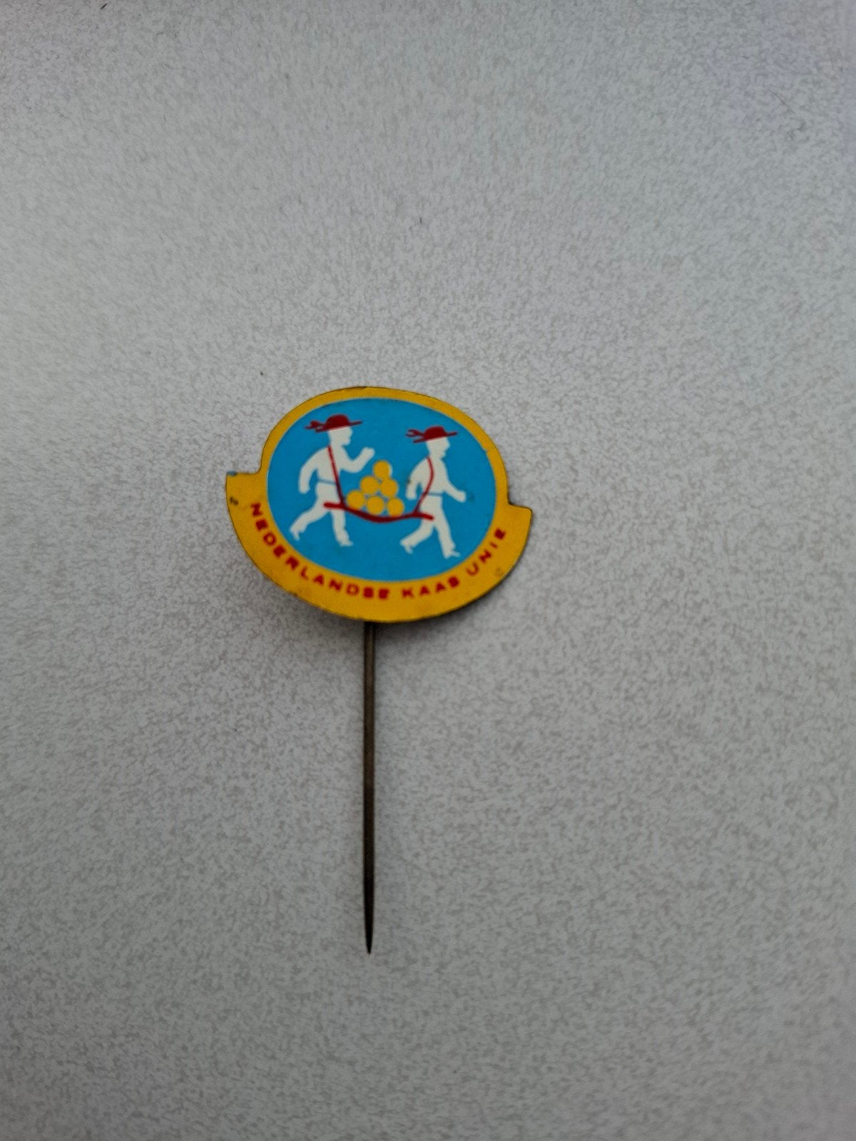 Vintage speldje pin prikker steekspeld Nederlandse Kaas Unie, Ophalen of Verzenden