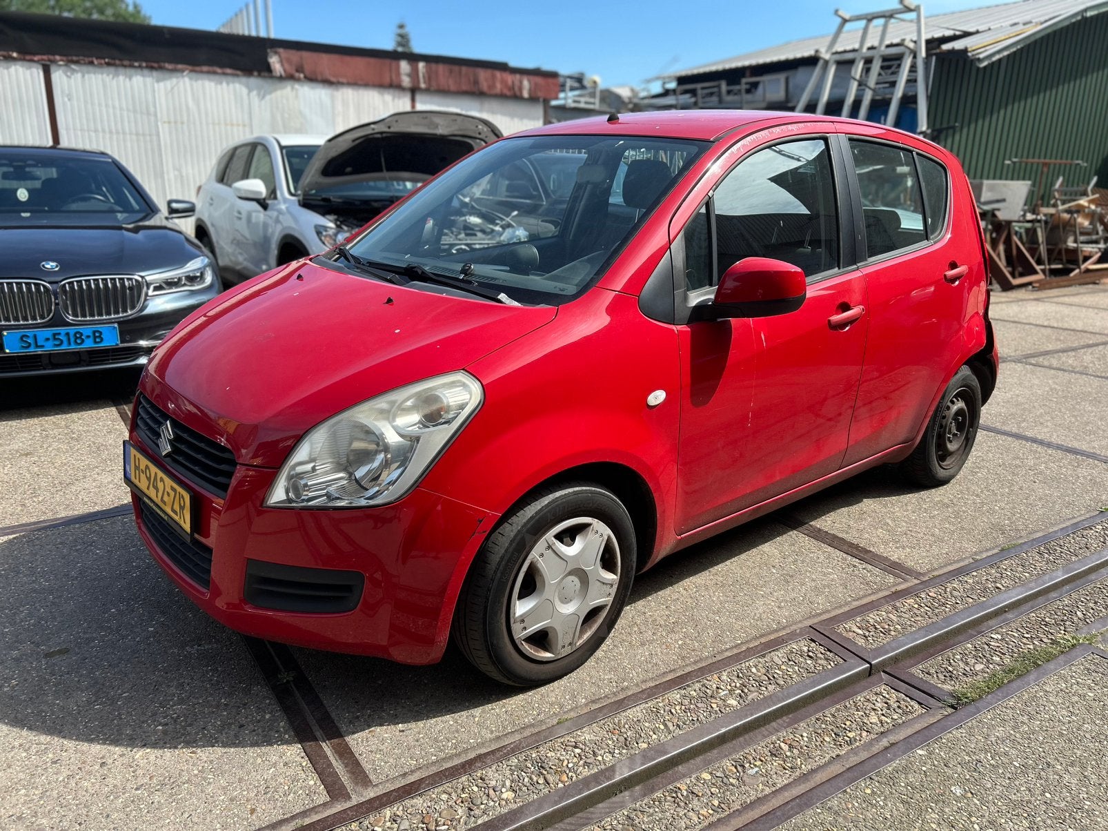 Suzuki Splash 1.0 2011 Rood, Auto diversen, Ophalen, 996 cc, Handgeschakeld, Benzine