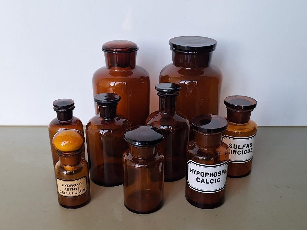 lot 9st oranje bruine glazen potten apothekerspotten 14-24cm, Antiek en Kunst, Curiosa en Brocante, Ophalen of Verzenden