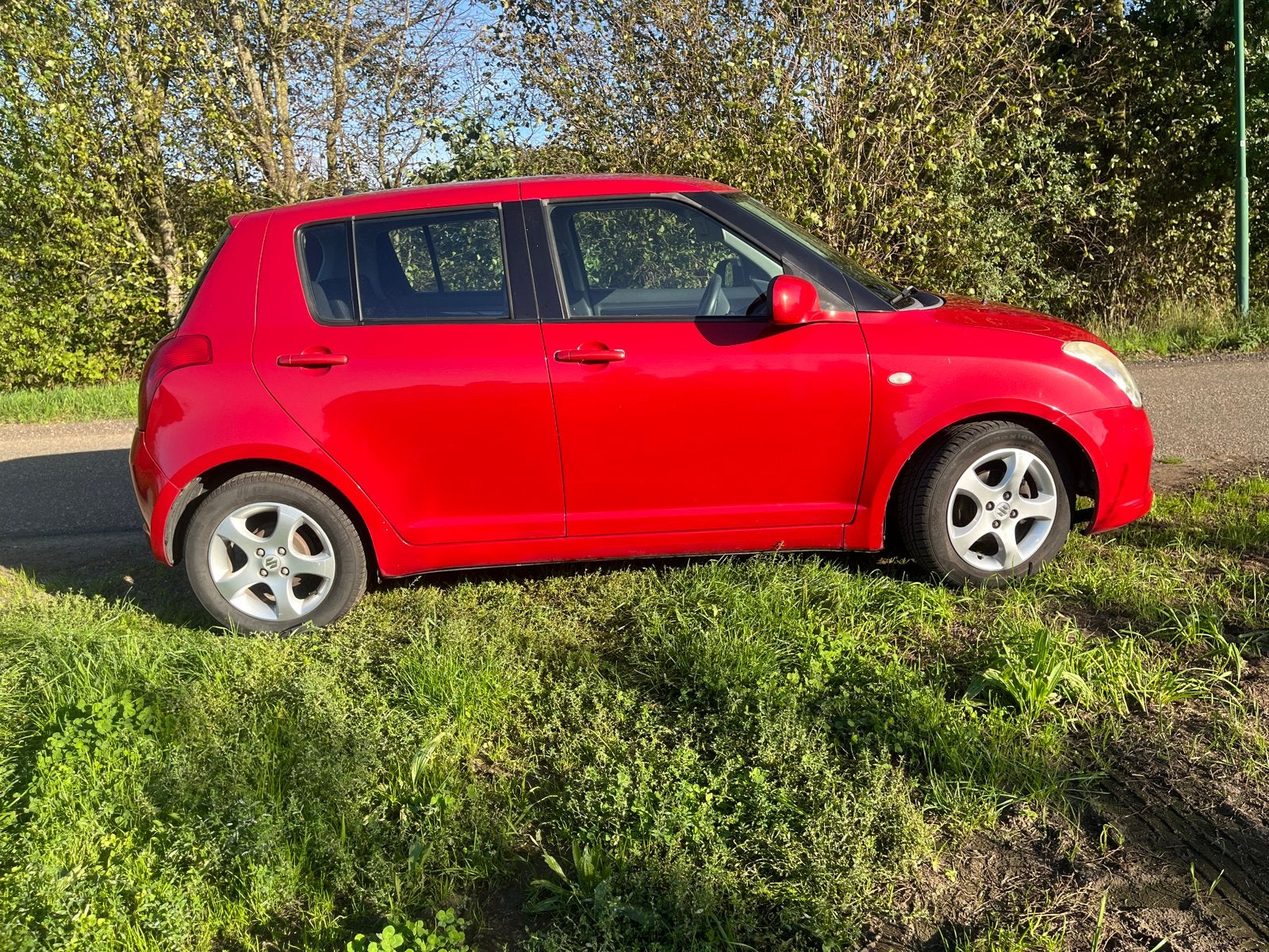 Suzuki Swift 1.3 5DRS 2007 Rood, Auto's, Voorwielaandrijving, 40 €/maand, 965 kg, 400 kg