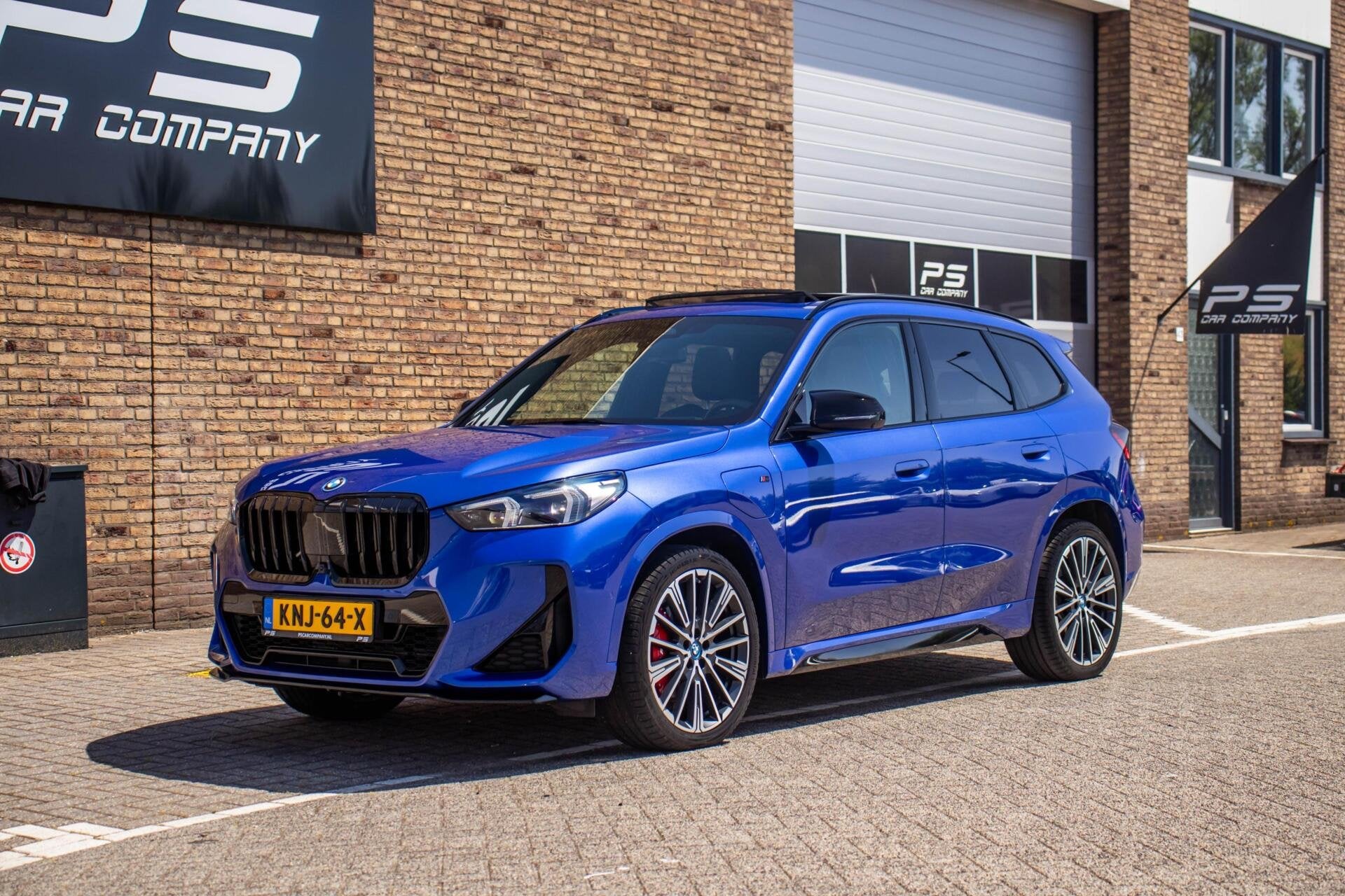 BMW X1 xDrive30e M-Sport, Full Option, Premium Select, Pano, Auto's, BMW, 12 maanden, Automatische klimaatregeling, Blauw, Bedrijf