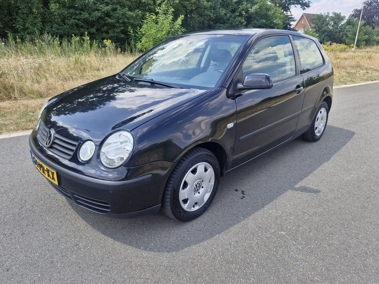 Volkswagen Polo 1.4 55KW AUTOMAAT 2004 Zwart AIRCO LEER, Auto's, Zwart, Grijs, Particulier, 1000 kg