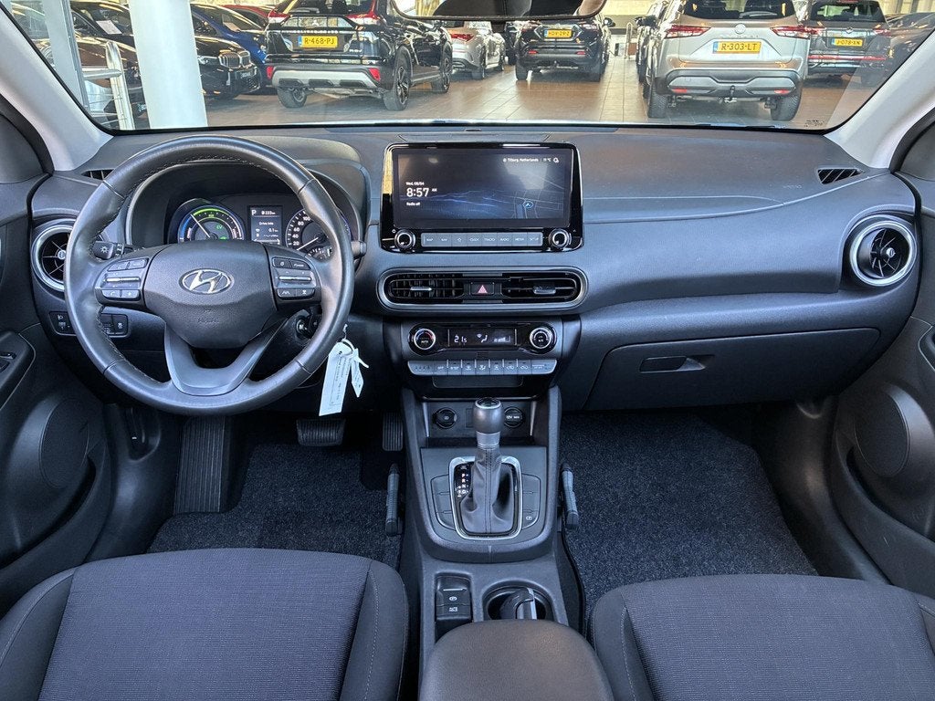 Hyundai Kona 1.6 GDI HEV Comfort Smart Automaat 105PK | Navi, Auto's, Stof, Euro 6, 2 kWh, Wit