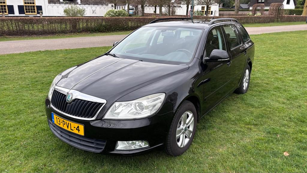 Skoda Octavia 1.2 TSI Combi 2011 Zwart, Auto's, Skoda, Particulier, Octavia, Airbags, Airconditioning, Climate control, Cruise Control