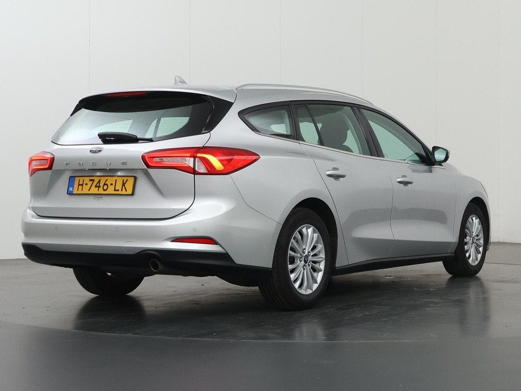 Ford Focus Wagon 1.0 EcoBoost Titanium Business | Winterpakk, Auto's, Ford, Gebruikt, 1283 kg, 23 km/l, Origineel Nederlands