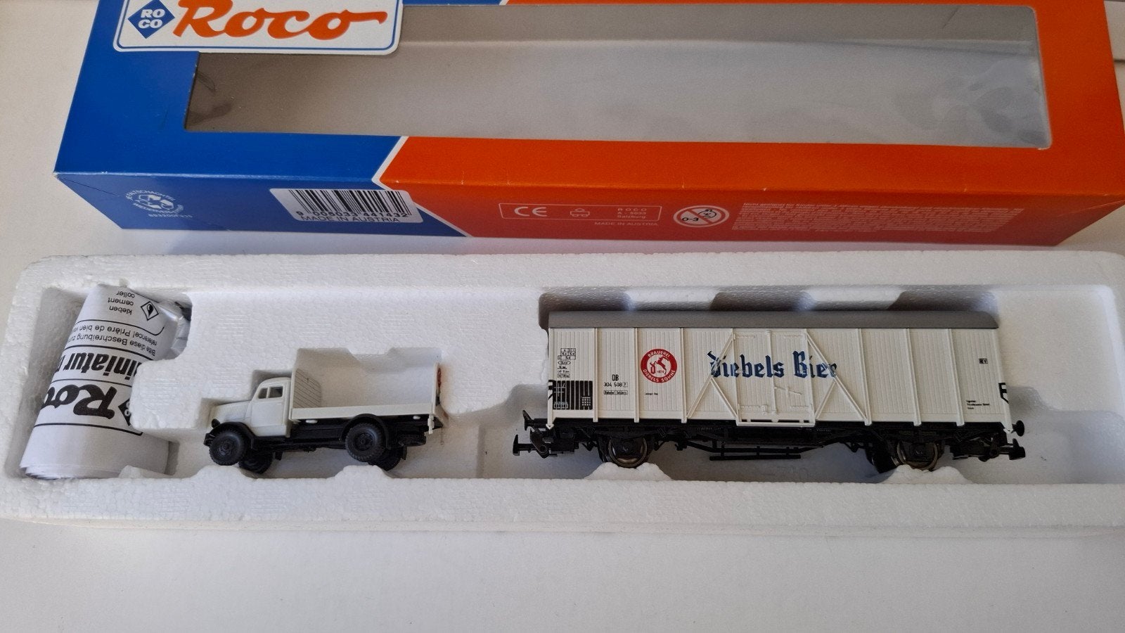 Roco 44143 goederenwagen Diebels bier + Opel Blitz+lading H0, Gelijkstroom, Wagon, Ophalen of Verzenden, Zo goed als nieuw