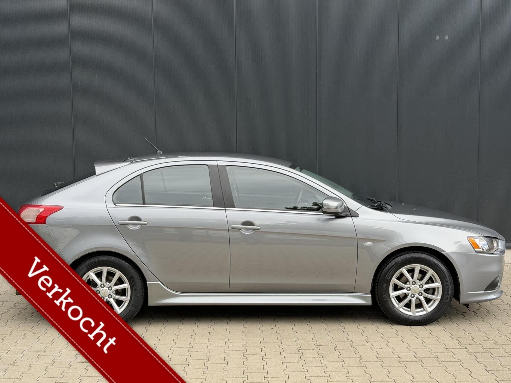 Mitsubishi Lancer Sportback 1.6 Limited Edition Trekhaak PDC, Auto's, Voorwielaandrijving, Stof, Gebruikt, 4 cilinders