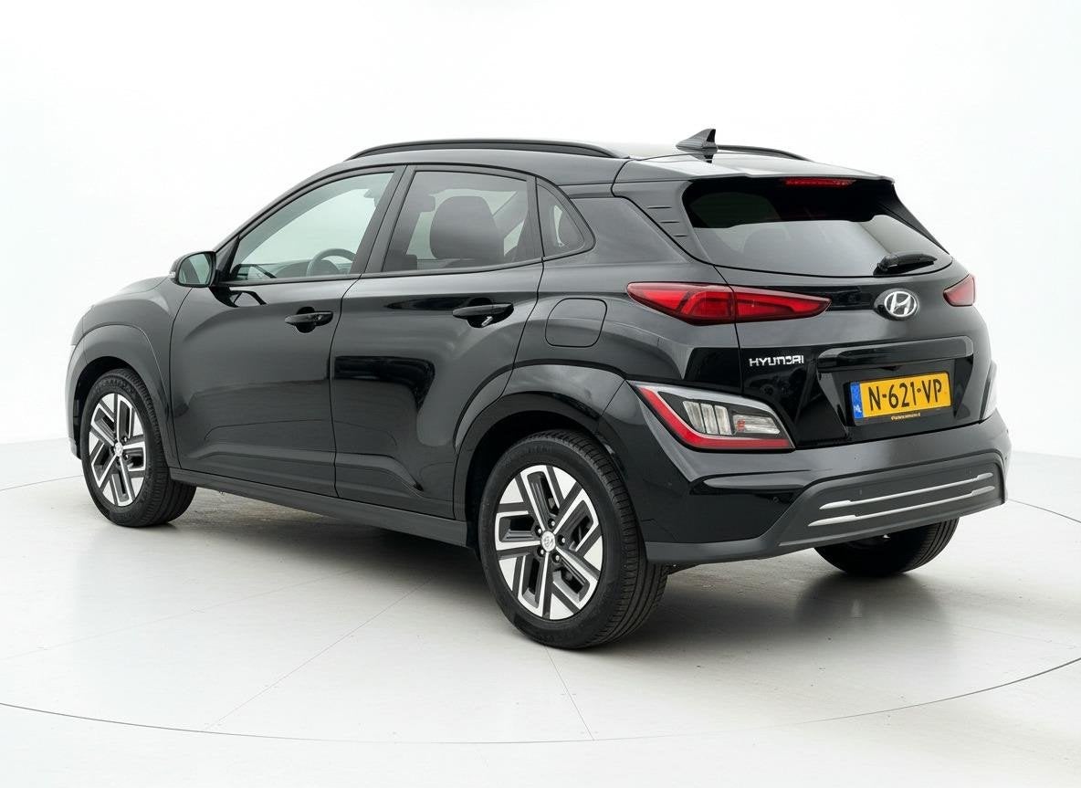 Hyundai Kona EV Fashion 64 kWh ADAPT.CRUISE HEADUP.DISPL CAM, Stof, Zwart, Origineel Nederlands, 410 min
