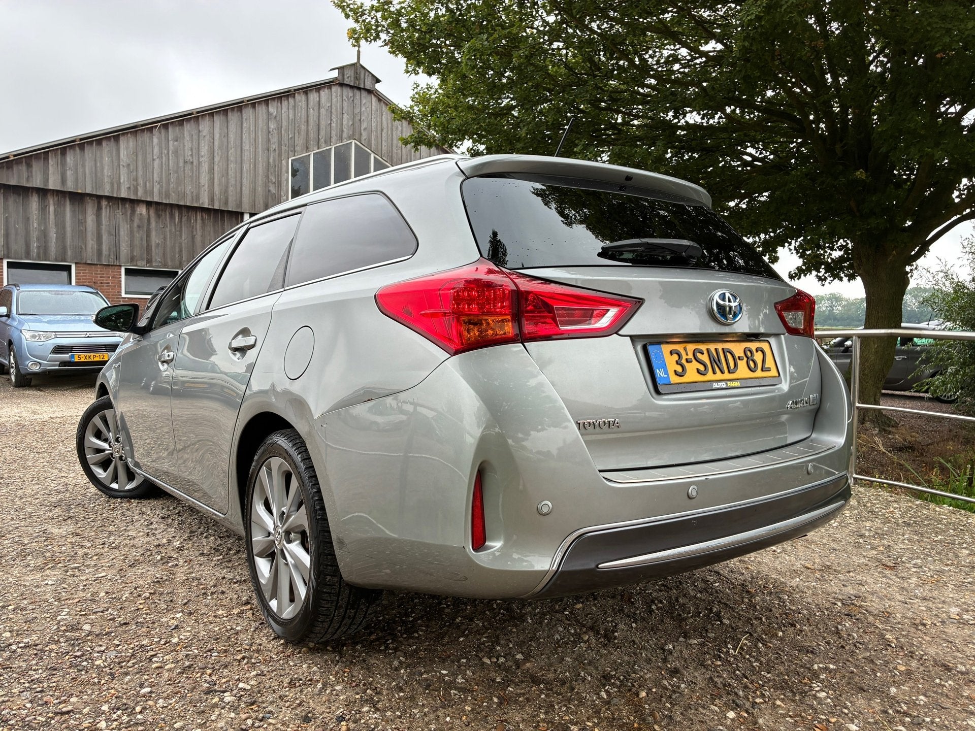 Toyota Auris Touring Sports 1.8 Hybrid Lease Pro | Panodak +, Auto's, Toyota, Euro 5, Gebruikt, Zwart, Leder en Stof