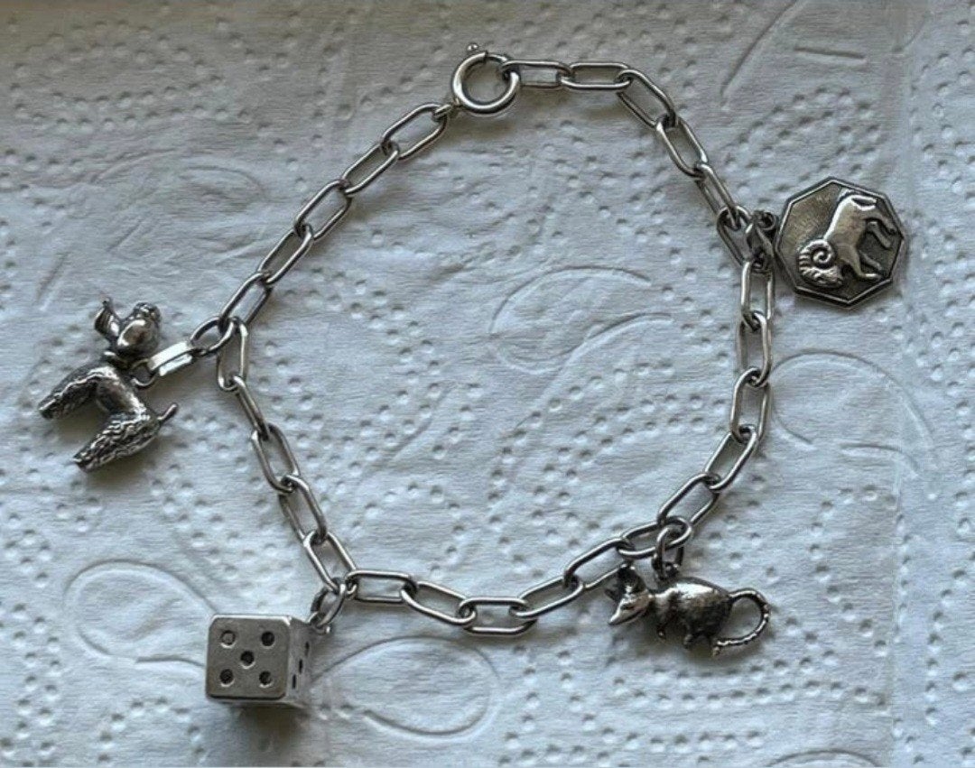 Zilveren bedelarmband met 4 bedels, Sieraden, Tassen en Uiterlijk, Armbanden, Ophalen of Verzenden, Zo goed als nieuw, Zilver