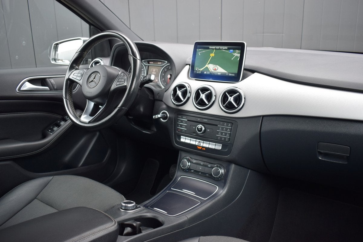 Mercedes-Benz B-Klasse 180 Automaat Prestige LED | Half Lede, 1325 kg, Gebruikt, Met garantie (alle), Leder en Stof