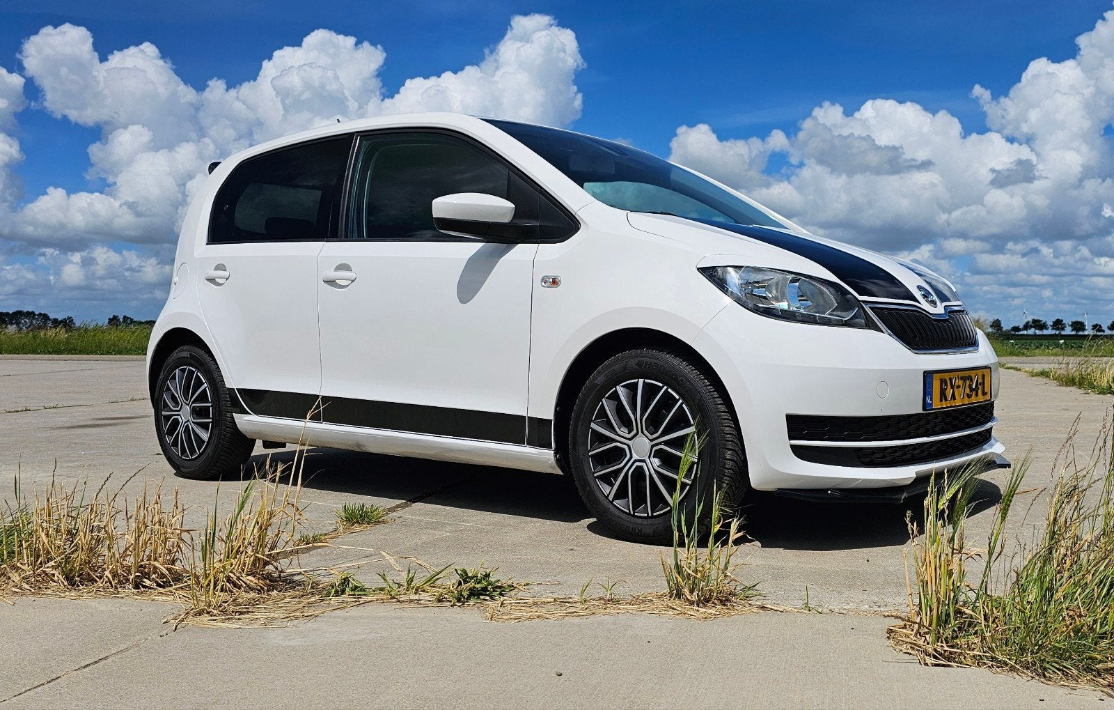 Skoda Citigo 60pk/ABS/Airco/Cruise Control/Bleutooth/D-Assis, Auto's, Voorwielaandrijving, Stof, 4 stoelen, Wit